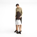 Woman In Beige Turtleneck Hugging Little Girl With White Skirt Standing Together