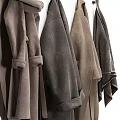Soft Hanging Towels in Neutral Brown Gray Beige Tones on White Background