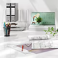 Modern Workspace Setup With Office Supplies Green Plant Coffee Cup And Wall Decor