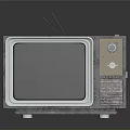 Vintage Electronic TV Set With Silver Case Antenna And Control Knobs