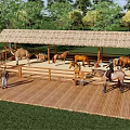 Outdoor Animal Enclosure With Thatched Roof Shelter Camels Horses And Wooden Deck Where People Interact