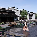 Traditional Chinese Commercial Landscape With White Walls Black Tiles Water Pond Green Plants And Pedestrians