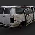 Abandoned White Van with Open Side Doors Rusted Worn Body and Overgrown Weeds