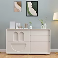 White Decorative Cabinet In Modern Living Room With Wall Art Floor Lamp And Decor Items