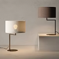 Modern Table Lamps With White And Brown Fabric Shades Metal Bases And Illuminated Light Source