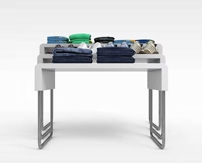 Modern White Display Rack With Metal Legs And Folded Colorful Garments 3d model