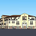 Classic Style Commercial Complex With Clock Tower Arched Entrances Balconies And Storefronts