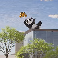 Artistic Panda Landscape Sculpture Holding Colorful Balloons Against Blue Sky