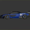 Blue McLaren Racing Car With Renault Logo Aerodynamic Rear Wing And Number 12