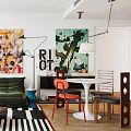 Modern Living and Dining Area Interior With Green Sofa Colorful Paintings Dining Table And Plants