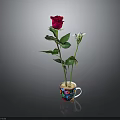 Red Rose and Small White Flower Arranged in Colorful Decorative Cup