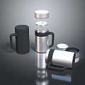 Modern Matte Black and Stainless Steel Mugs with Removable Lids on Reflective Surface