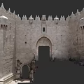 Ancient Stone Fortress Gate With Arched Entrance Crenellated Walls And Towers
