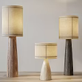 Minimalist Floor Lamps With Wooden Bases And Cream Lamp Shades On Wooden Floor