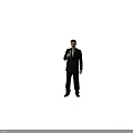 Man In Black Suit Holding Champagne Glass Standing Against Beige Background