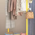 Yellow And Blue Clothes Rack With Hanging Clothes Hat Handbag And Coin Back Basket