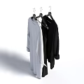 White and Black Clothes Hanging on Hangers with Long Sleeves and Simple Style