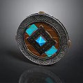 Decorative Circular Ornament With Blue Gemstone Inlaid Wooden Center And Metallic Rim