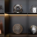 Elegant Decorative Ornament Collection Displayed on Black Shelves With Warm Lighting and Various Designs