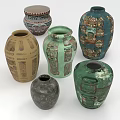 Collection of Colorful Ceramic Vessels with Various Intricate Decorative Patterns