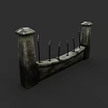 Stone Fence With Decorative Pillars And Metal Spikes For Garden Security
