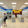 Modern Supermarket Interior With Bright Lighting Customers Shopping Neatly Arranged Shelves And Various Goods