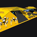 JTEKT Exhibition Booth Featuring Golden Yellow Structure Tables Chairs and Screens