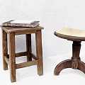 Two Vintage Wooden Stools with Stacked Books and Upholstered Seat Design