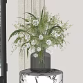 Elegant Glass Vase with White Flowers and Green Foliage on Decorative Table by Snowy Window