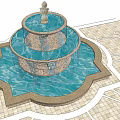 Classical Multi Tiered Fountain With Flowing Water And Paved Surrounding Area