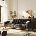 Comfortable Black Leisure Sofa Set In Living Room With Pillows Green Plant And Artwork