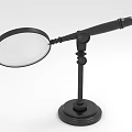 Black Magnifying Glass With Adjustable Stand And Circular Lens On Base