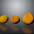 Three Oranges of Different Sizes on Black Background with Reflections 3d model