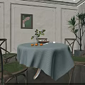 Round Dining Table Set With Striped Tablecloth Fruits Plants And Wooden Chairs With Woven Seats
