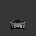 Silver Porsche Style Sports Car With Sleek Design And Reflective Surface On Gray Background