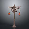 Vintage Carved Building Lamp Post With Double Orange Lanterns And Intricate Metal Design
