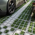 Efficient Parking Lot With Sports Car Motorcycle Scooter On Grid Patterned Pavement And Surrounding Bushes
