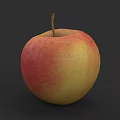 Fresh Ripe Red and Yellow Apple with Stem on Dark Background