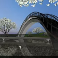 Modern Arched Landscape Bridge With Metal Railings Over Water And Tree Reflections