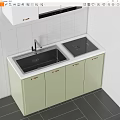 Modern Kitchen Sink with Light Green Cabinets Gold Handles and Black Countertop