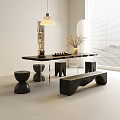 Modern Black Tea Table and Chairs with Tea Set Dried Flowers in Bright Room