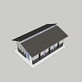 Small Single Story Building With White Dark Exterior Walls Blue Door And Sloped Roof