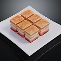 Layered Square Pastries with Golden Crust and Red White Layers on White Square Plate