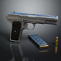 Vintage Silver Metallic Pistol with Magazine and Single Bullet on Black Surface