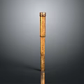 Golden Decorative Column With Textured Surface Ornate Top Bottom Accents On Dark Background Reflective Base