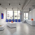 Modern Café Interior With White Furniture Blue Chairs And Abstract Art