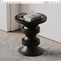 Modern Black Circular Side Table With Stacked Ring Base And Magazines 3d model
