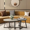 Round Coffee Tables with White Flower Bouquet Tea Set Living Room Beige Sofa Decorative Pillows