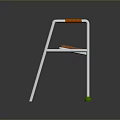 White Frame Mobility Walker With Orange Handles Seat And Green Foot Pads