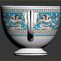 Elegant Porcelain Cup With Blue And White Floral Patterns And Decorative Rim